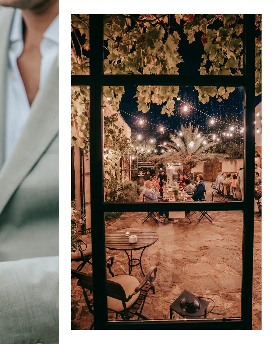 Ein Blick durch ein Fenster auf den nächtlichen Innenhof der Finca Alaiar, der mit Lichterketten und Weinreben geschmückt ist. Die Menschen sitzen an Tischen, essen und unterhalten sich und schaffen eine warme und festliche Atmosphäre, die zu einem Hochzeitsfotograf Mallorca passt.